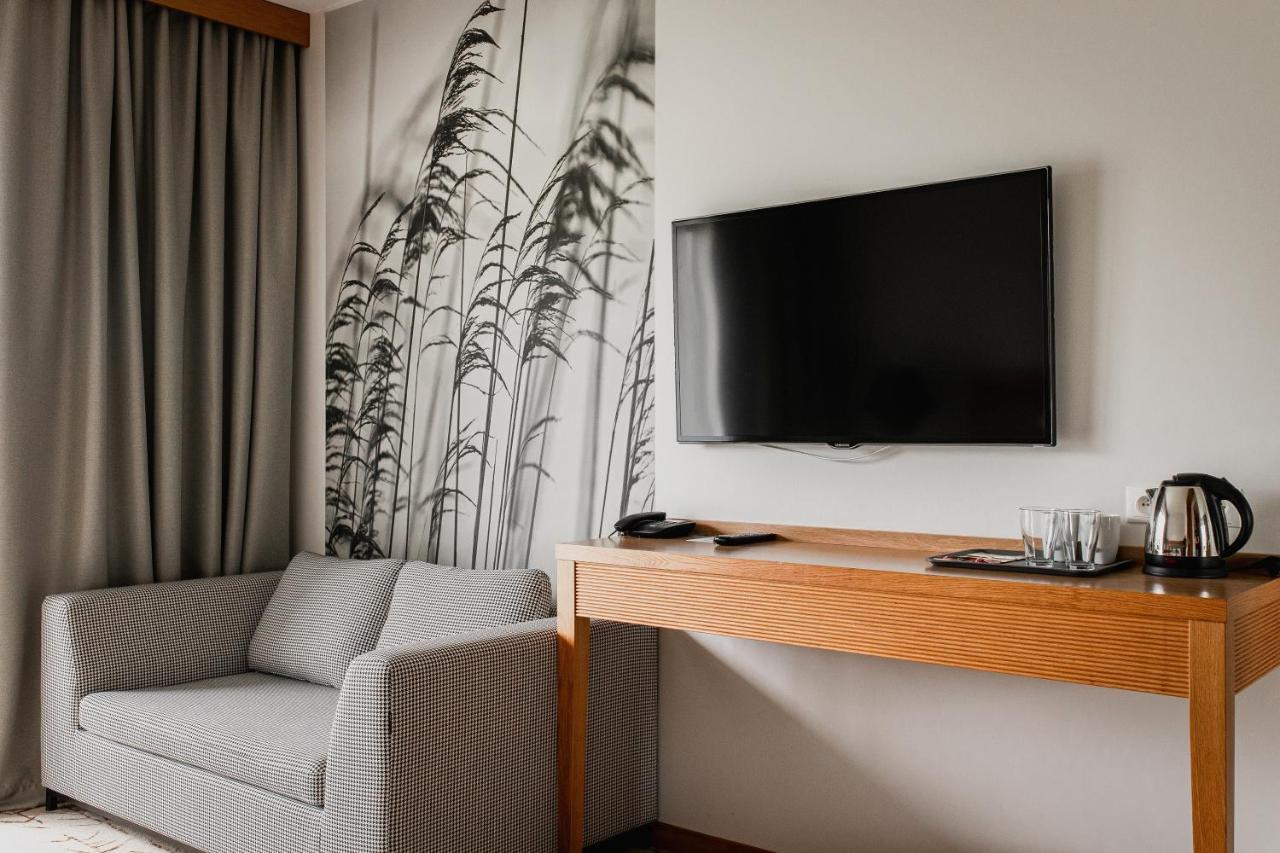 Hotel Marina Club Olsztyn  Exterior photo A television in a hotel room