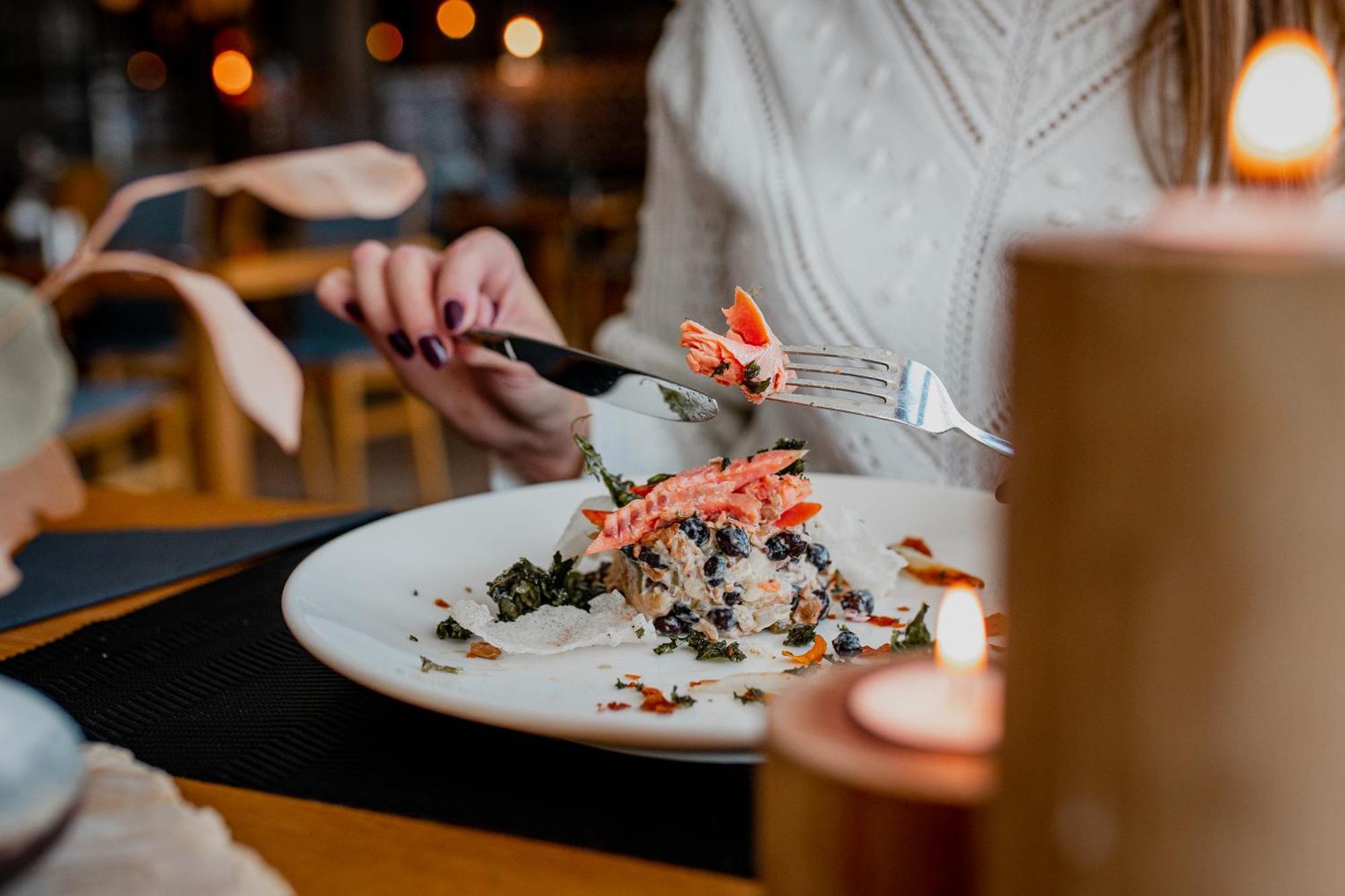 Hotel Marina Club Olsztyn  Exterior photo A woman eating a salad